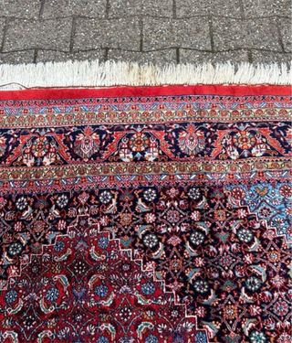 Alfombra persa hecha a mano