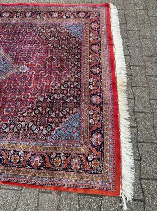 Alfombra persa hecha a mano