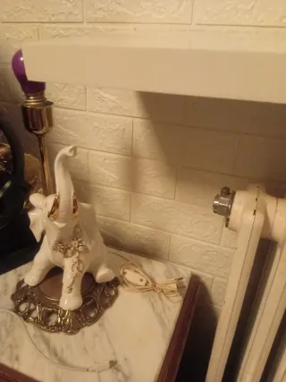 Lámpara de elefante de porcelana dorada