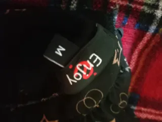 Blusa estampada cuello alto manga larga