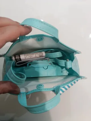 Bolso infantil mascota interactiva