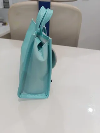 Bolso infantil mascota interactiva