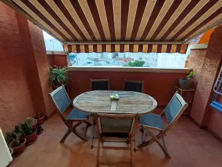 Conjunto mesa y sillas de terraza.