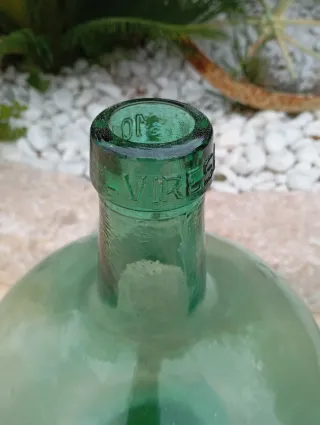 Antiche damajuanas in vetro