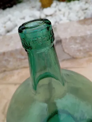 Antiche damajuanas in vetro