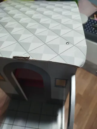 Casa de muñecas de madera