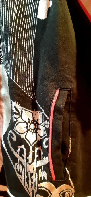 Sudadera con doble estampado de rostros