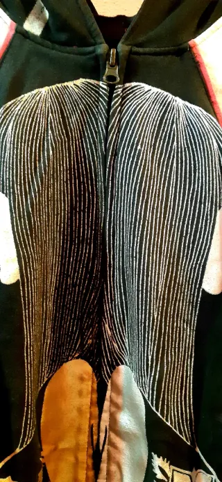 Sudadera con doble estampado de rostros