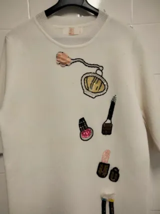 Vestido de punto blanco con apliques