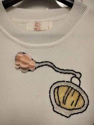 Vestido de punto blanco con apliques