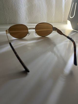 Gafas vintage doradas y marrones