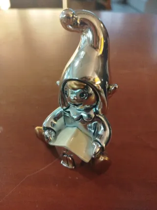 Statuine argentate elefante e folletto