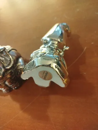 Statuine argentate elefante e folletto