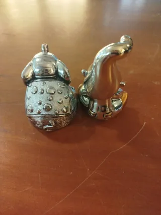 Statuine argentate elefante e folletto