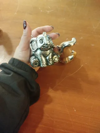 Statuine argentate elefante e folletto