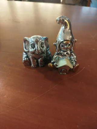 Statuine argentate elefante e folletto