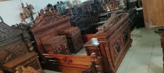 Dormitorio madera tallada ángeles