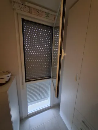 Ventanas aluminio hojas abatibles y cerramiento