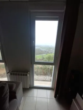 Ventanas aluminio hojas abatibles y cerramiento