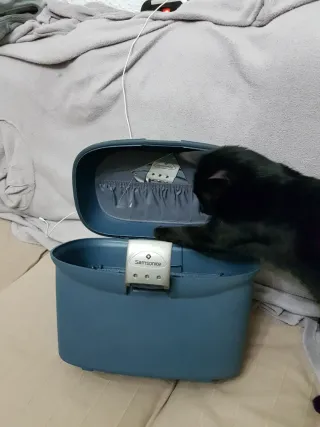 Maleta de viaje Samsonite azul y plateada