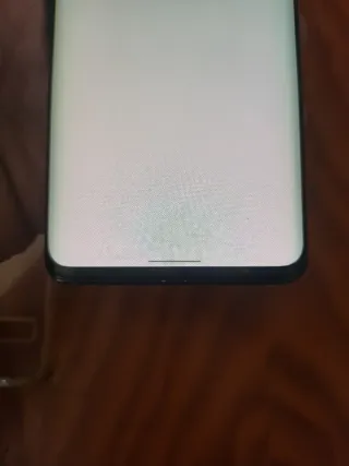 Funda transparente TCL + Móvil negro