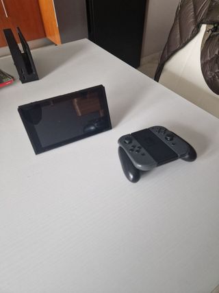 Nintendo Switch V1 + accessori + 2 giochi