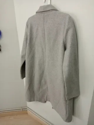 Abrigo gris jaspe botón bolsillos