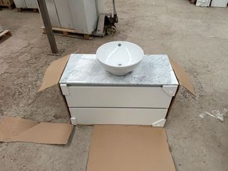 Mueble de baño con lavabo blanco