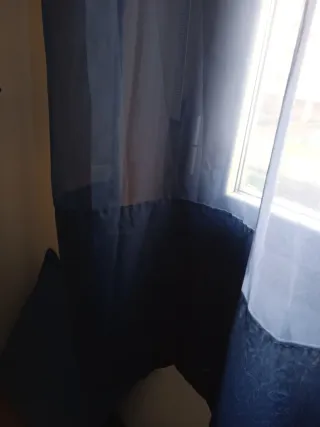 Cortinas de anillas. Azules y moradas.