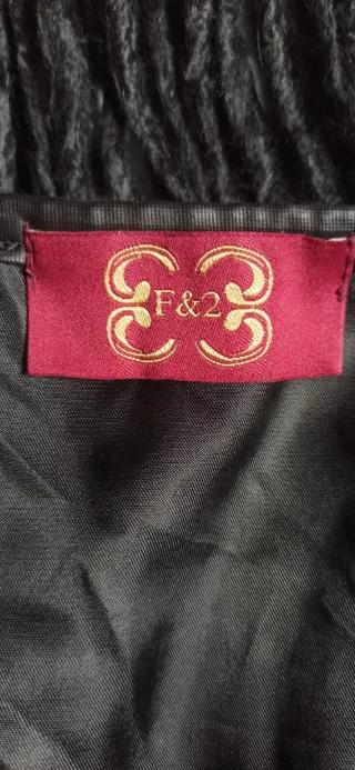 Armilla F&2 con flecos y plumas