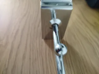 Appendiabiti da parete in metallo argentato