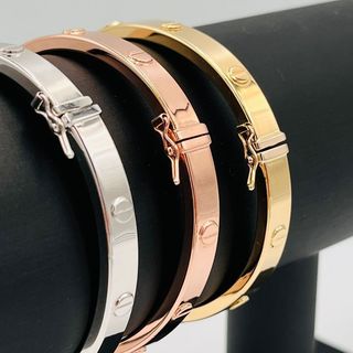 PULSERA RIGIDA TORNILLO ORO ROSA.