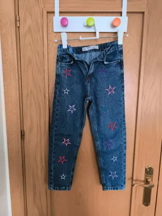 Abrigo niña rosa talla 7/8 y vaquero.