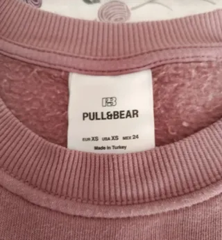 Sudadera holgada vintage rosa empolvado.
