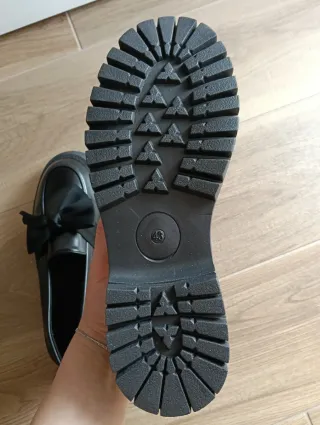 Mocassini neri con fiocco