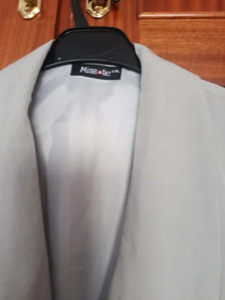 Conjunto chaleco y pantalón beige