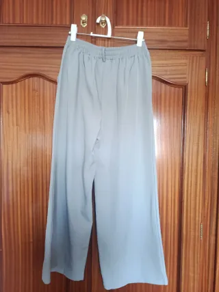 Conjunto chaleco y pantalón beige