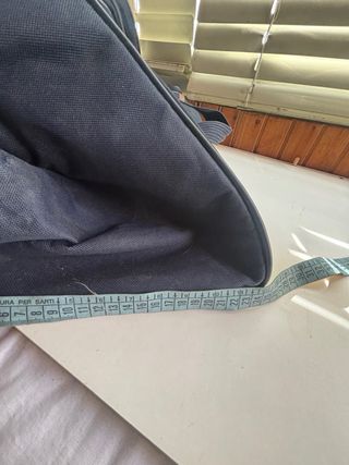 Borsone da viaggio blu scuro con dettagli marroni