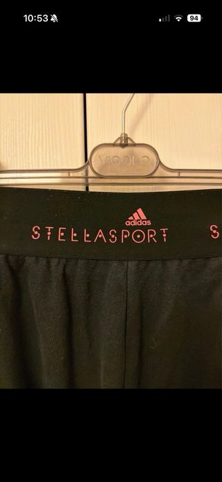 Pantaloni tuta Adidas neri con dettagli rossi