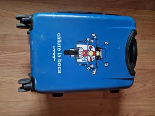Maleta pequeña azul con dibujo de moto