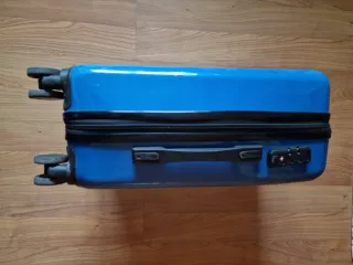 Maleta pequeña azul con dibujo de moto