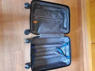 Maleta pequeña azul con dibujo de moto