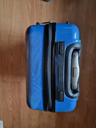 Maleta pequeña azul con dibujo de moto