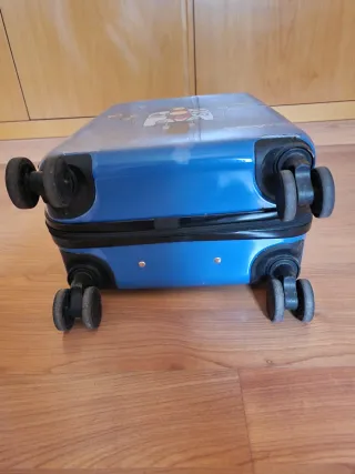 Maleta pequeña azul con dibujo de moto