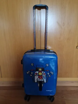 Maleta pequeña azul con dibujo de moto