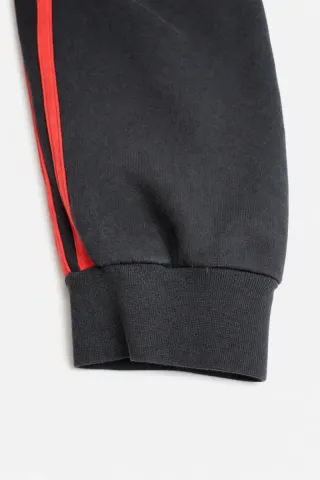 Pantalón deportivo Adidas negro con franjas rojas