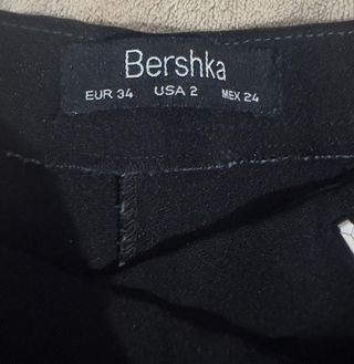 Pantalón elástico acampanado negro