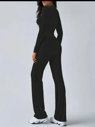 Tuta nera elasticizzata TG M