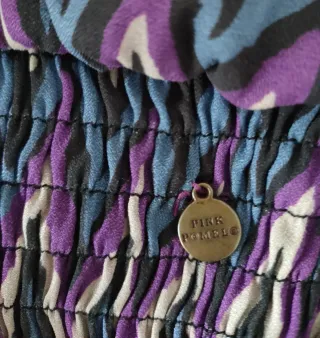 Blusa crop estampado geométrico multicolor