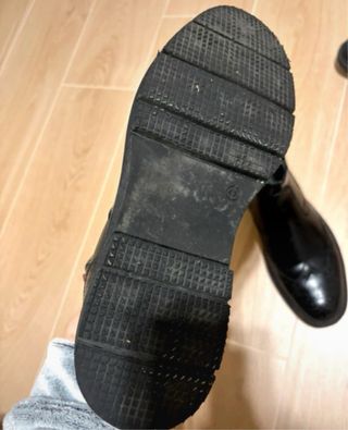 Stivaletti neri eleganti con brogue